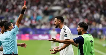 Aymen Hussein was sent off for celebrating Iraq's second goal in the Asian Cup.