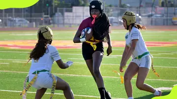 Jordyn Jefferson of Wilson loses her flag to Poly players