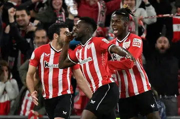 Inaki Williams (centre) put Bilbao ahead with a little help from his brother Nico (right) who got the second goal against Atletico