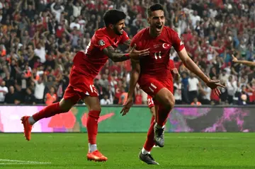 Turkey forward Umut Nayir (right) opened the scoring against Wales