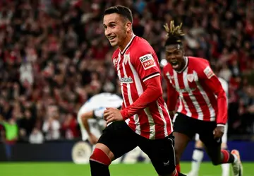 Athletic Bilbao's Spanish forward Alex Berenguer celebrates scoring the opening goal against rivals Real Sociedad in the Basque derby clash at San Mames