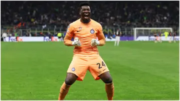 Andre Onana celebrates during the UEFA Champions League semi-final second leg match between Inter Milan and AC Milan at Stadio Giuseppe Meazza. Photo by Alexander Hassenstein.