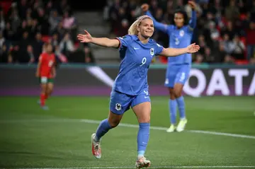 Eugenie Le Sommer celebrates scoring one of her two goals in France's 4-0 win over Morocco