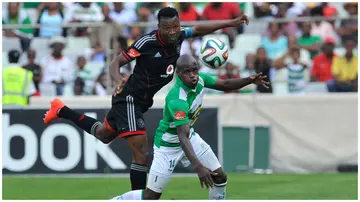 Orlando Pirates' Siyabonga Sangweni vies for the ball against a Bloemfontein Celtic player during an Absa Premiership match at Free State Stadium on April 21, 2014, in Bloemfontein, South Africa. Photo: Charle Lombard.