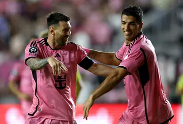 Lionel Messi celebrates with Luis Suarez after scoring in Inter Miami's 3-1 CONCACAF Champions Cup win over Nashville on Wednesday.