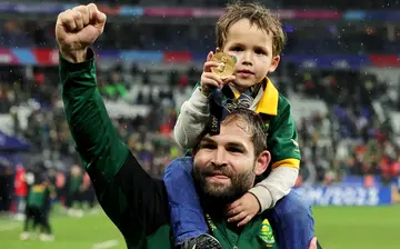 Cobus Reinach and his son