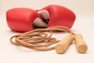 Boxing gloves and skipping rope.