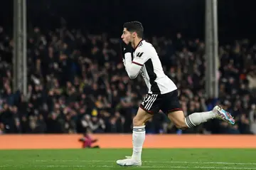 Fulham forward Manor Solomon celebrates scoring against Wolves