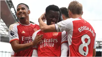 Eddie Nketiah celebrates with teammates after scoring during the Premier League match between Arsenal FC and Nottingham Forest at Emirates Stadium. Photo by Stuart MacFarlane.