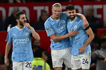 Manchester City forward Erling Haaland (centre)