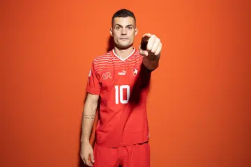 Who is the captain of the Switzerland national team in this world cup?