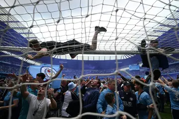 Manchester City's fans invaded the pitch after beating Aston Villa to win the 2021/22 Premier League