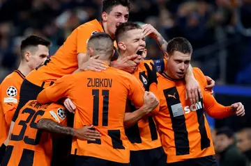 Shakhtar Donetsk players celebrate the goal that gave them a shock 1-0 win against Barcelona