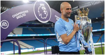 Pep Guardiola with the Premier League trophy during the Premier League match between Manchester City and Aston Villa at Etihad Stadium. Photo by Robbie Jay Barratt.