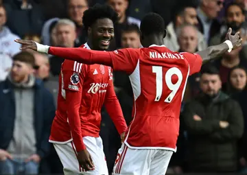 Ola Aina (L) celebrates his first goal for Nottingham Forest.