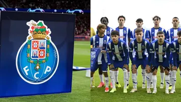 Logo of FC Porto and players pose for a photograph