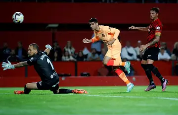 Atletico Madrid's Spanish forward Alvaro Morata tries to beat Mallorca's Serbian goalkeeper Predrag Rajkovic