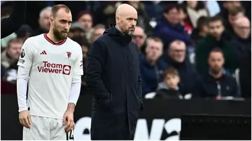 Christian Eriksen and Erik ten Hag during the Premier League match between West Ham United and Manchester United at London Stadium. Photo by Sebastian Frej.