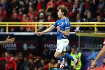 Nicolo Barella celebrates scoring Italy's second goal against Albania in Dortmund