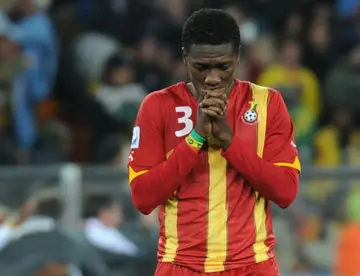 Ghana forward Asamoah Gyan was crestfallen after Uruguay's controversial victory in 2010