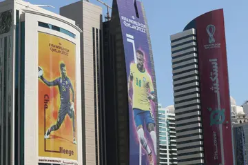 Banners on buildings in the Qatari capital Doha show Neymar and other World Cup stars