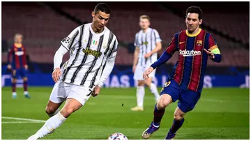 Cristiano Ronaldo is challenged by Lionel Messi during a previous UEFA Champions League match between Juventus and Barcelona.