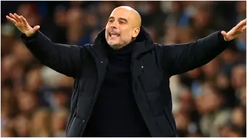 Pep Guardiola gestures during the Premier League match between Manchester City and Brentford FC at Etihad Stadium. Photo by Chris Brunskill.