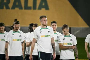 Harry Souttar (C) in training with his Australia teammates in Doha on Monday