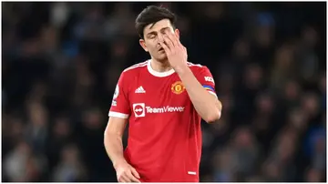 Harry Maguire looks dejected during the Premier League match between Manchester City and Manchester United at Etihad Stadium. Photo by Michael Regan.