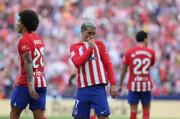 Atletico Madrid forward Antoine Griezmann snatched a late winner from the penalty spot in his team's triumph over Real Sociedad