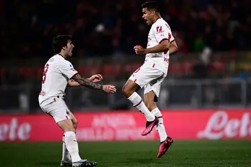 Jump for joy: Junior Messias  (right) celebrates his winner