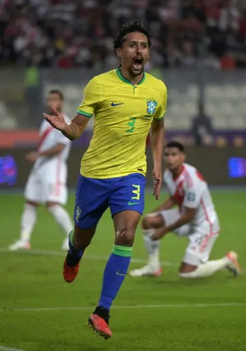 Brazil's defender Marquinhos celebrates after scoring the 90th minute winner against Peru in Lima on Tuesday