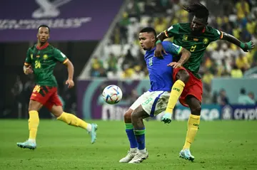 Injured - Arsenal and Brazil forward Gabriel Jesus (C) in action against Cameroon at the World Cup