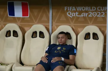 Kylian Mbappe slumps on the bench after France lost to Argentina in the World Cup final