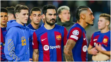 Barcelona players look dejected after losing their Champions League match against Paris Saint-Germain. Photo by Adria Puig.