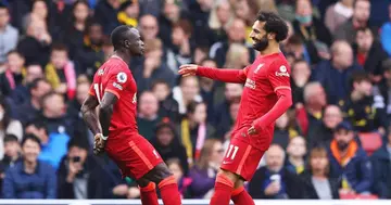 Mohamed Salah and Sadio Mane celebrate together after Liverpool's first goal against Watford.