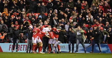 Lewis Grabban of Nottingham Forest celebrates with teammates after scoring their side's first goal during the Emirates FA Cup Third Round match against Arsenal at City Ground (Photo by Michael Regan/Getty Images)