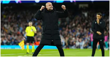 Pep Guardiola, Manager of Manchester City celebrates during a UEFA Champions League clash at Etihad Stadium. Photo by Tom Flathers.