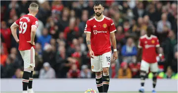 Bruno Fernandes looks dejected following Manchester City's second goal during the Premier League match between Manchester United and Manchester City at Old Trafford. Photo by Clive Brunskill.