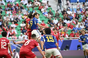 Japan forward Ayase Ueda scored twice