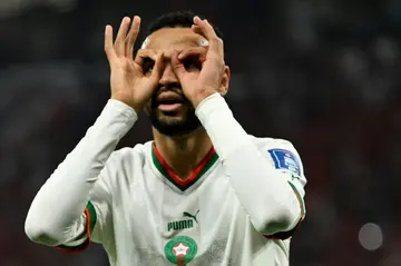 Youssef En-Nesyri celebrates scoring Morocco's second goal in the World Cup win against Canada that secured top spot in Group F