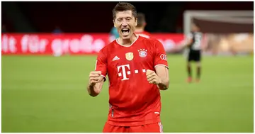 Robert Lewandowski celebrates scoring the 4th team goal during the DFB Cup final match between Bayer 04 Leverkusen and FC Bayern Muenchen. Photo by Alexander Hassenstein.