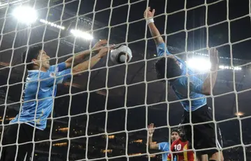 Uruguay striker Luis Suarez stopped the ball with his hand in 2010