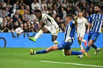 Real Madrid's Brazilian forward Vinicius Junior smashing home his second goal against Alaves in the Bernabeu rout