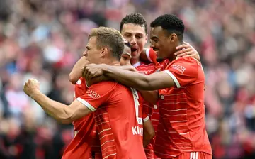 Bayern Munich have gone four points clear of Borussia Dortmund with a dominant 6-0 win over Schalke on Saturday
