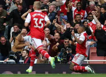 Arsenal striker Gabriel Jesus (R) celebrates scoring against Tottenham