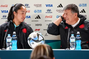 Columbia coach Nelson Abadia (right) and team member Mayra Ramirez talk to media in Sydney ahead of Saturday's quarter-final against England