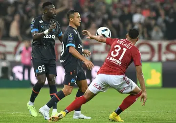 Alexis Sanchez (C) in action on his debut for Marseille against Brest on Sunday