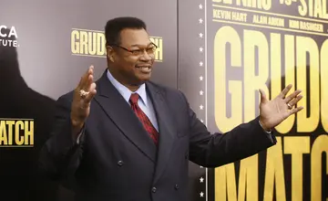 Larry Holmes attends the "Grudge Match" screening benefitting the Tribeca Film Institute at Ziegfeld Theatre
