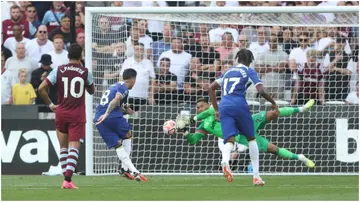 Chelsea's Enzo Fernandez sees his penalty saved by West Ham United's Alphonse Areola during the Premier League match at London Stadium. Photo by Rob Newell.